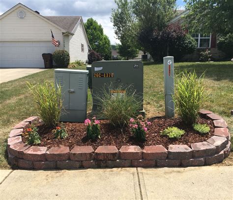 electric meter box cover ideas|landscaping around transformer box.